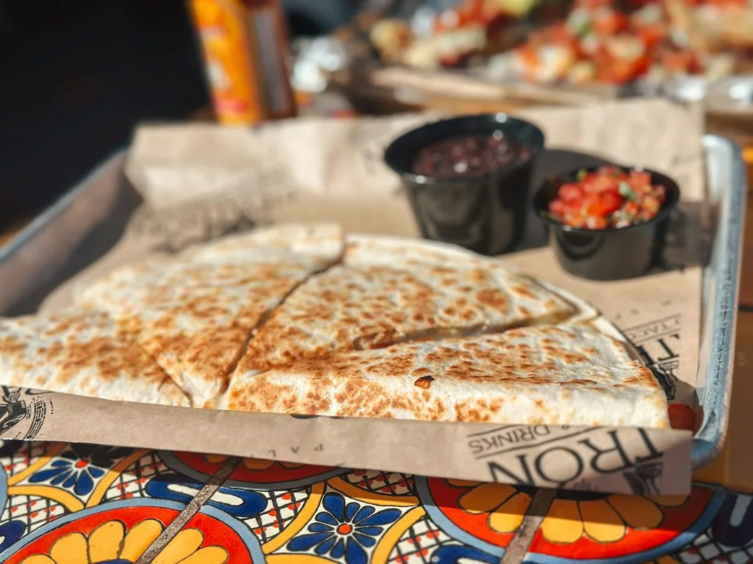 Crispy toasted tortilla quesadillas filled with melted cheese and seasoned black beans