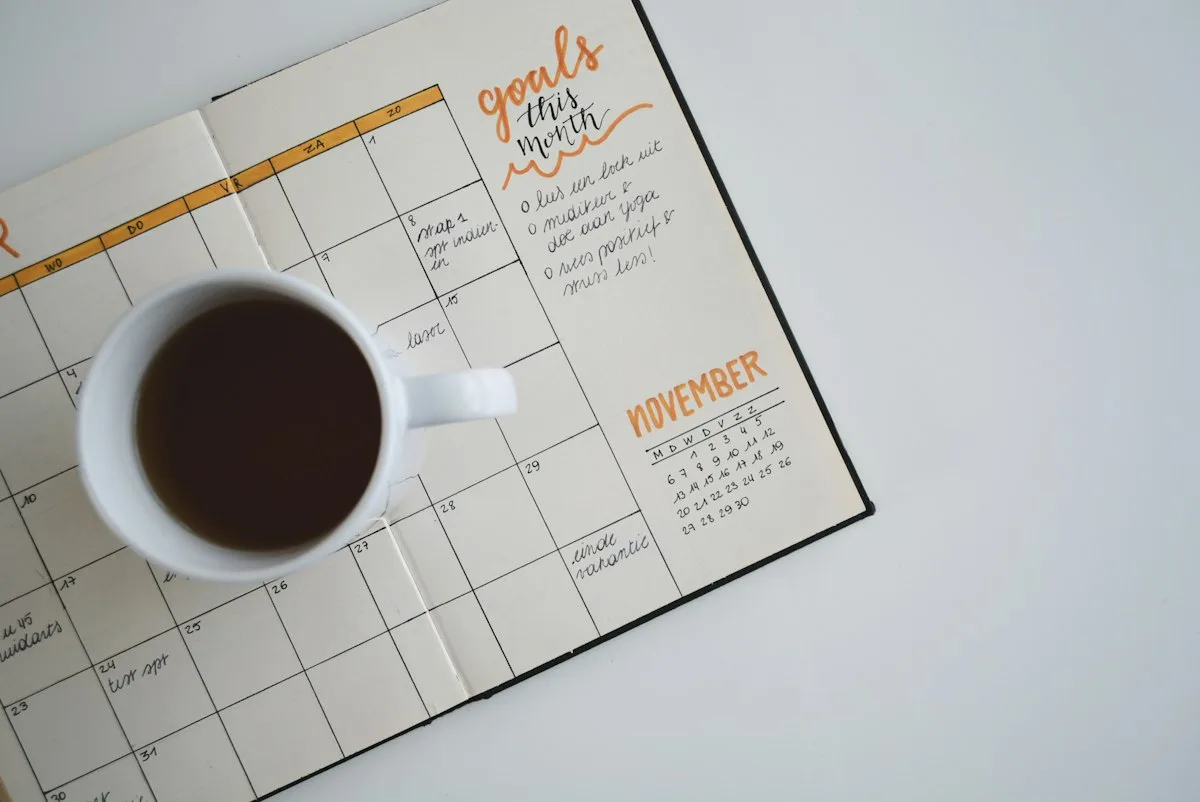 Wall calendar planner showing consecutive daily dates checked off during no-spend month