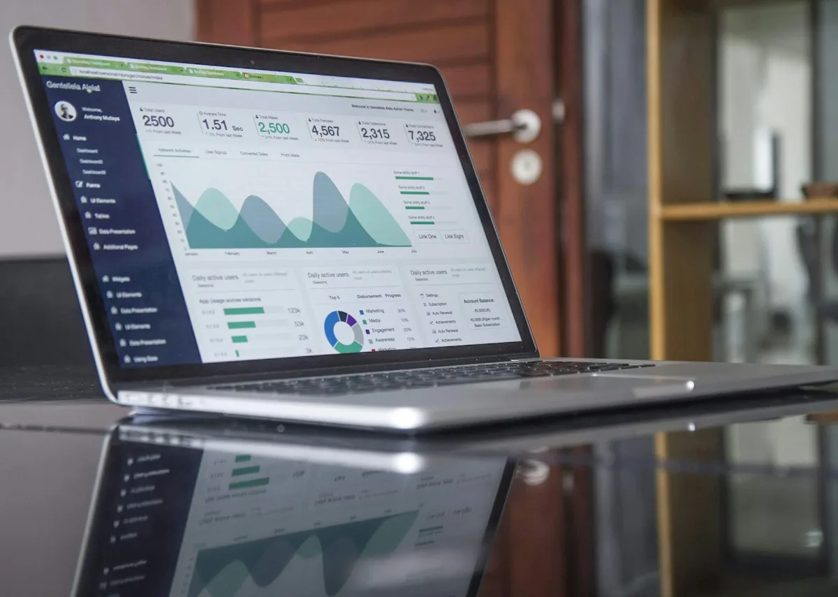 Laptop screen displaying camelcamelcamel historical price drop tracker chart line graph
