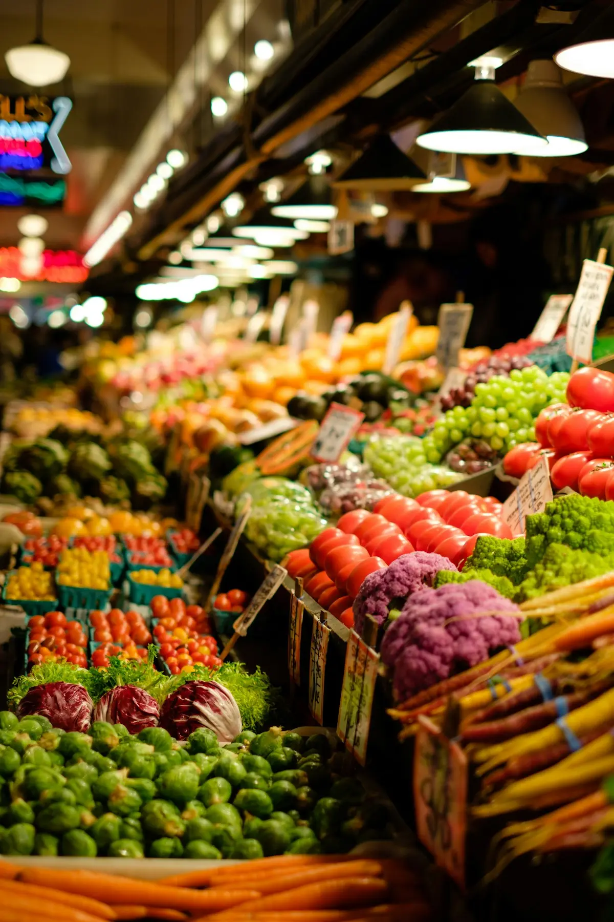 Supermarket cash register conveyer belt holding fresh whole foods and household groceries at checkout